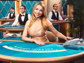A live dealer at the blackjack table.