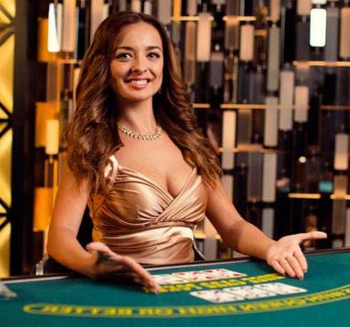 A woman at a blackjack casino table.